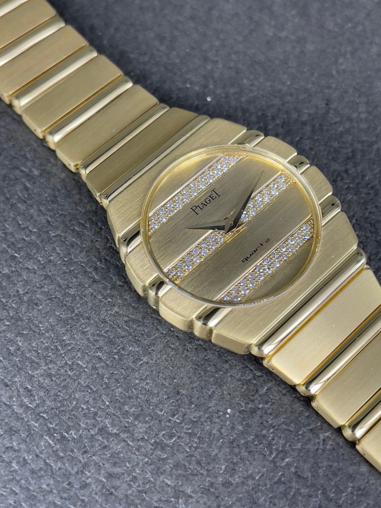 Thumbnail: Piaget Polo 27mm ref:  761 C 701 full yellow gold Diamonds.