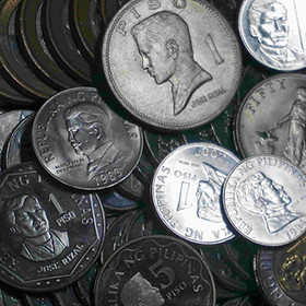 assorted philippine coins featuring national heroes and republic-era designs across different denominations