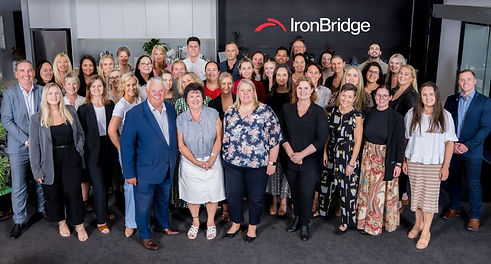 Iron Bridge Property Group team celebrating 20 years of excellence in property management
