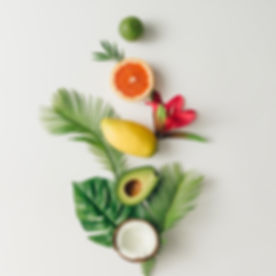 Creative layout made of summer tropical fruits and leaves.jpg Flat lay.jpg Food concept.jpg