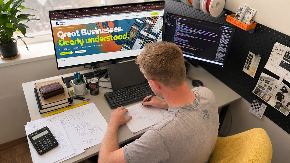 Nathan Cranston sketching website layout ideas at the Verosia Studio desk