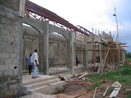 Lecture building steps with roof going on.jpeg