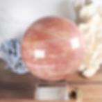large rose quartz crystal ball left side