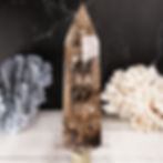large smoky quartz crystal point left side