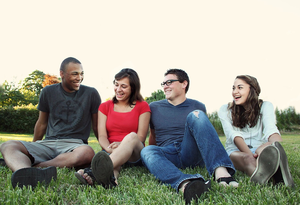 Group in group counseling smiling
