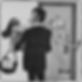 A cartoon of a newly married male and female couple. The man is carrying the woman into their new apartment.