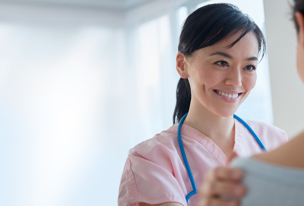 Nurse Talking to Patient