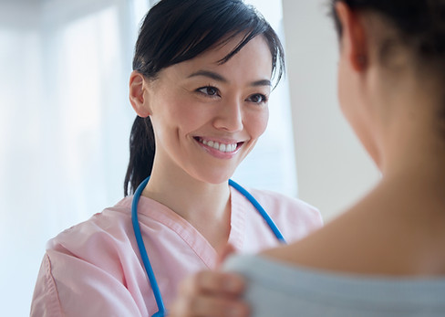 Nurse comforting patient