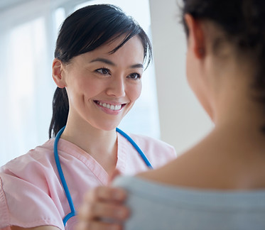 Nurse comforting patient