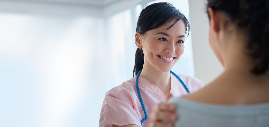Nurse comforting patient