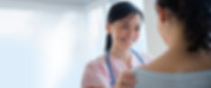 Nurse Talking to Patient