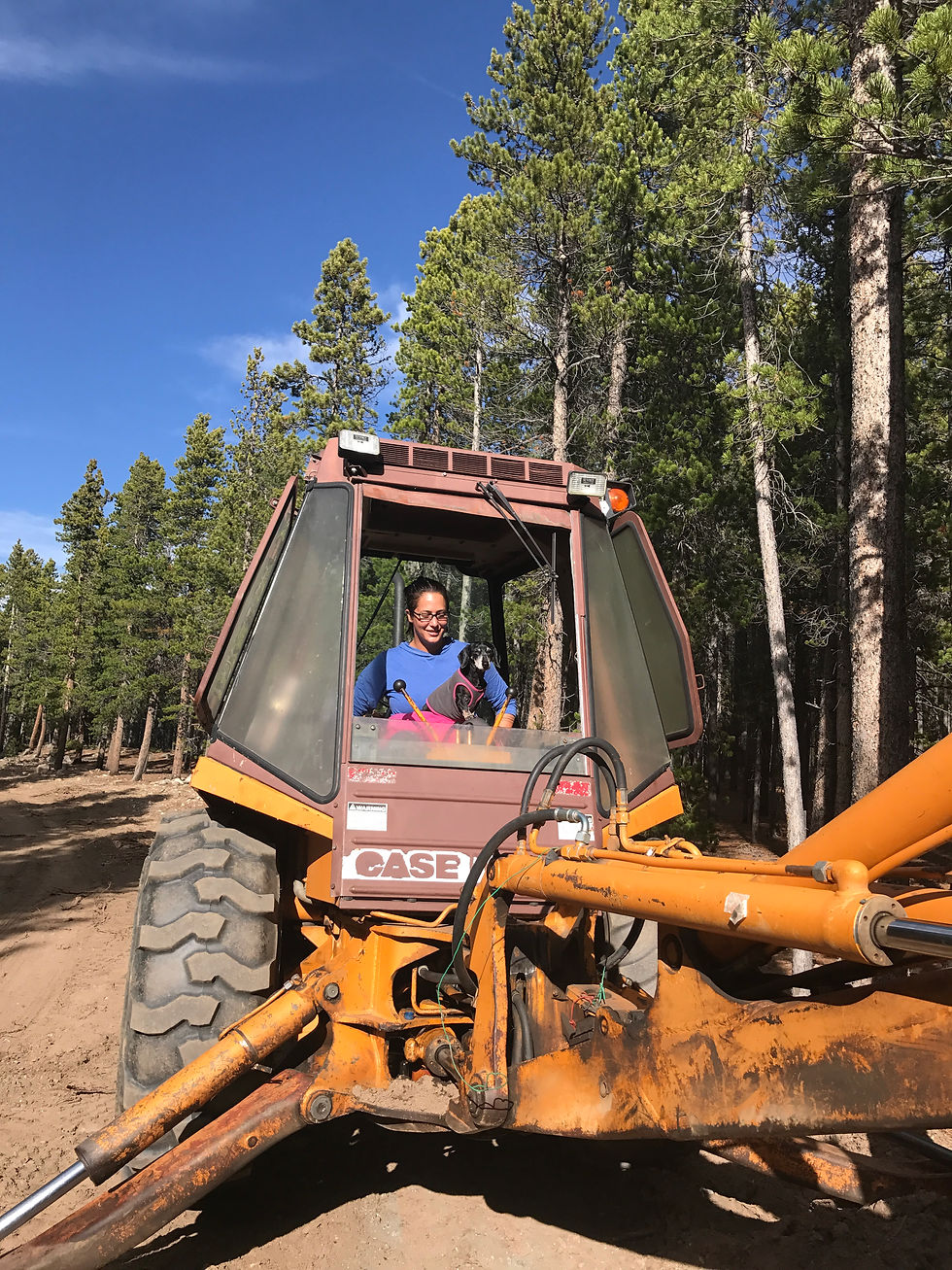Amanda Calderon driving a tractor