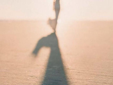 a woman walking in the distance