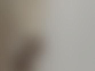 a decorative bow hanging from a doorknob