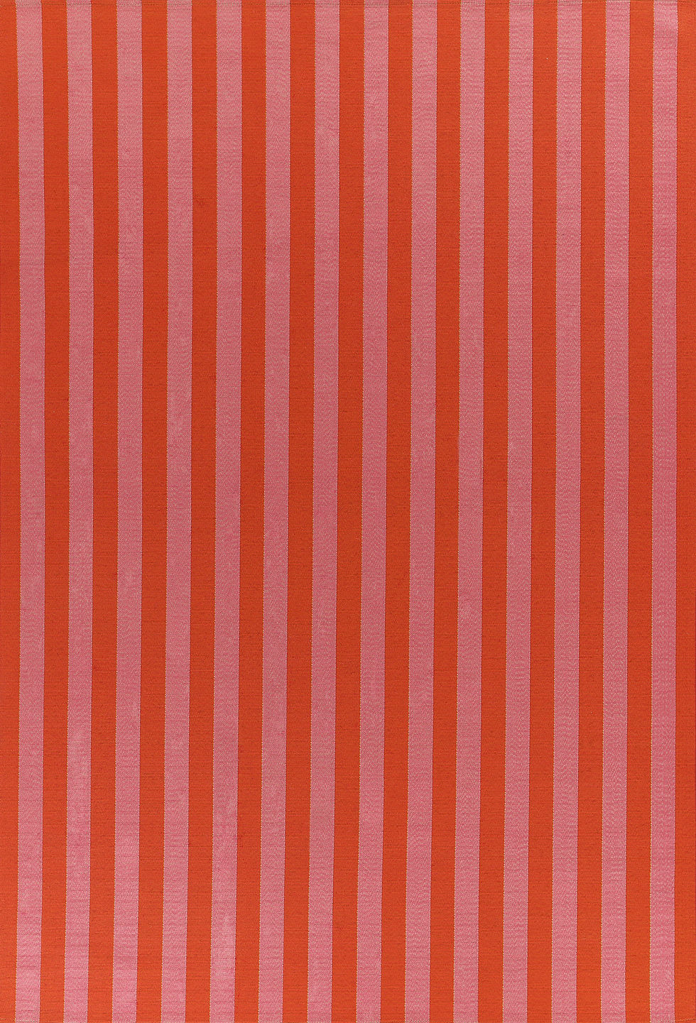 Red and pink vertical striped indoor/outdoor rug.