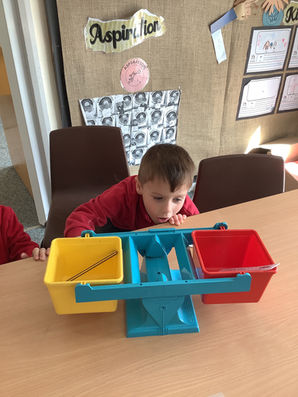 Heavier or Lighter - Y1 Maths