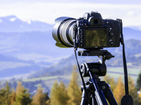 Camera photographing a mountain range