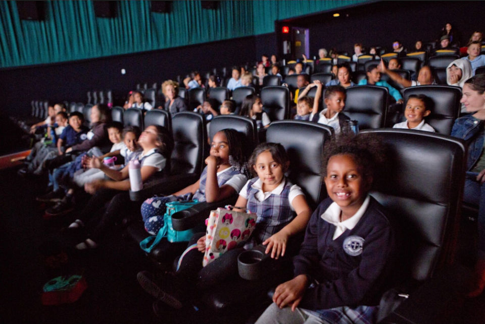 A young audience enjoys watching Team Marco at the Smith Rafael Film Center during the Mill Valley Film Festival.