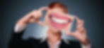 a person holding a smile photograph