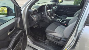 Custom car floor liner with raised edges installed