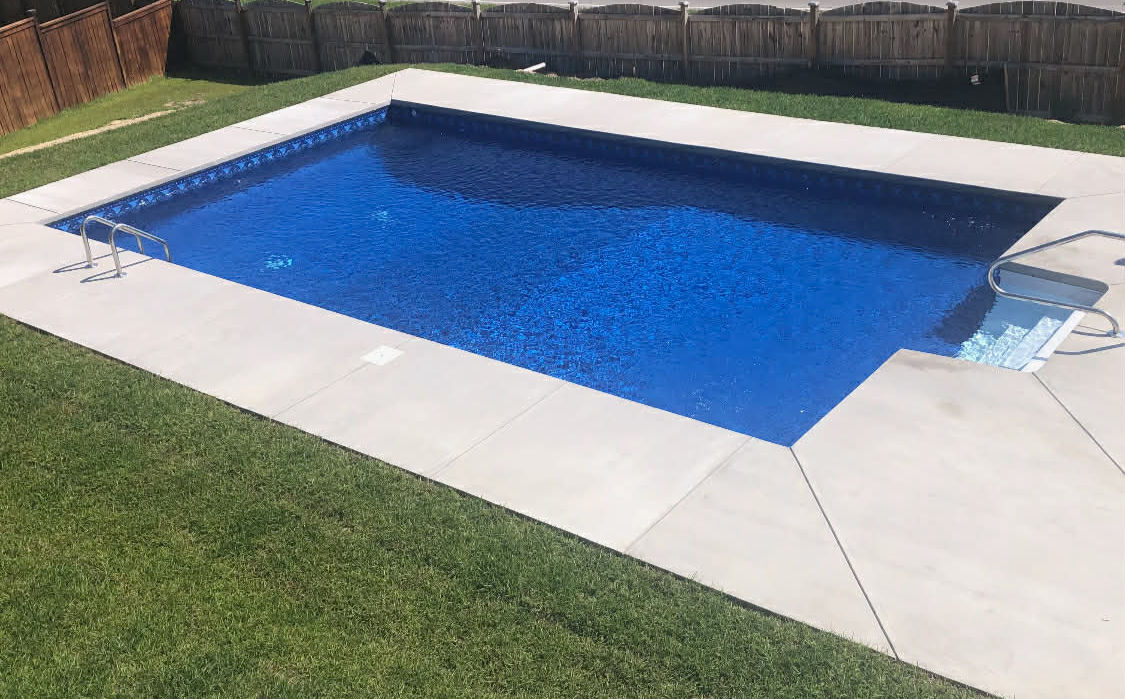 New concrete around pool_edited.jpg