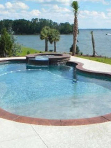 rounded pool with hot tub raised.jpg
