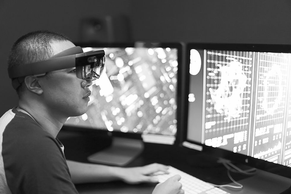 Man playing virtual reality with Microsoft HoloLens