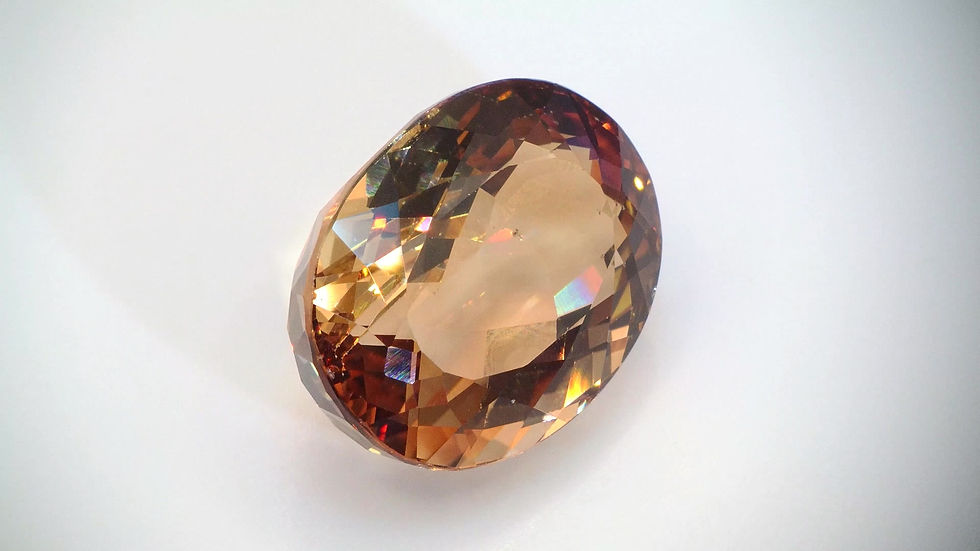 Miniature : 26.42 ct Topaze Champagne Ovale Naturelle