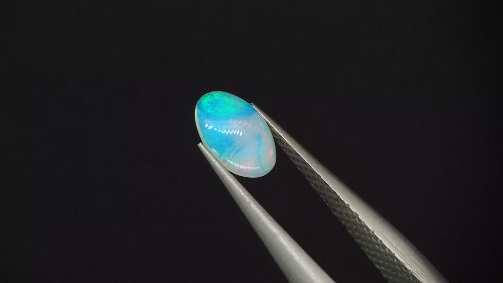 Miniaturbild: 0.19 Ct. Natur Opal Cabochon Oval mehrfarbig