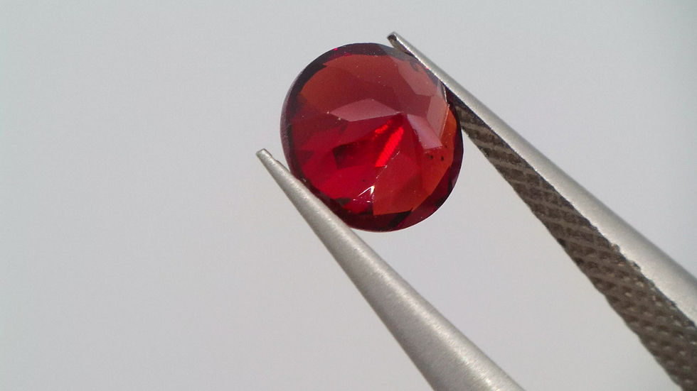 Miniature : 0.53 ct Grenat Orange rouge Naturel