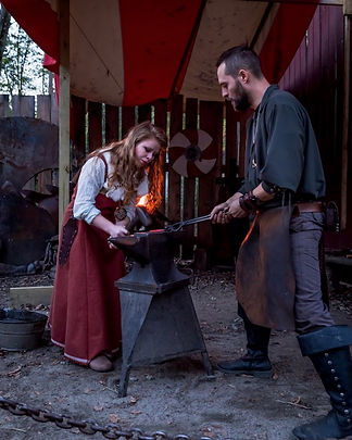 viking woman forging.jpeg