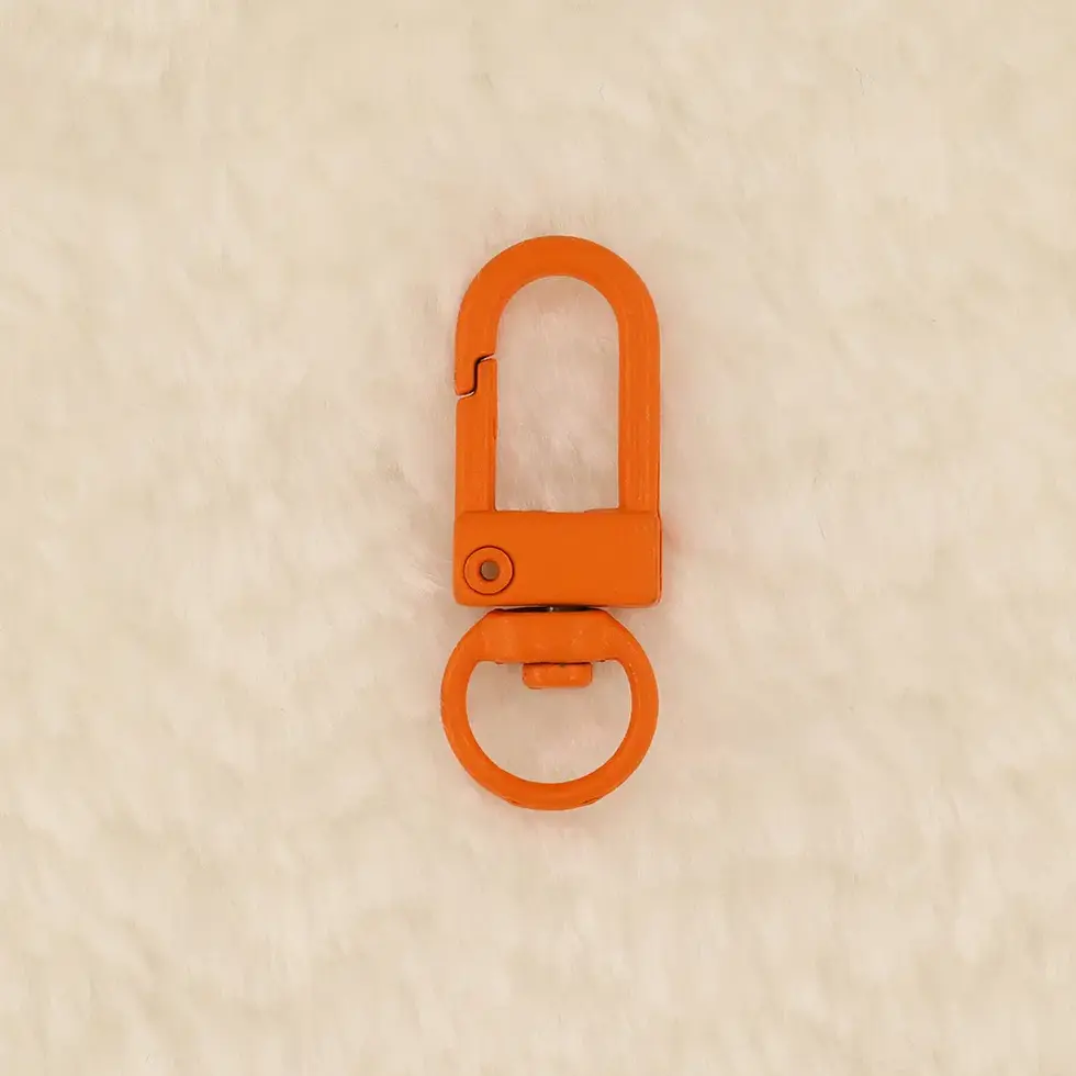 Porte-clé de type mousqueton, orange, embout en arc de cercle
