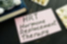 sticky note on doctor's desk regarding HRT hormone replacement therapy