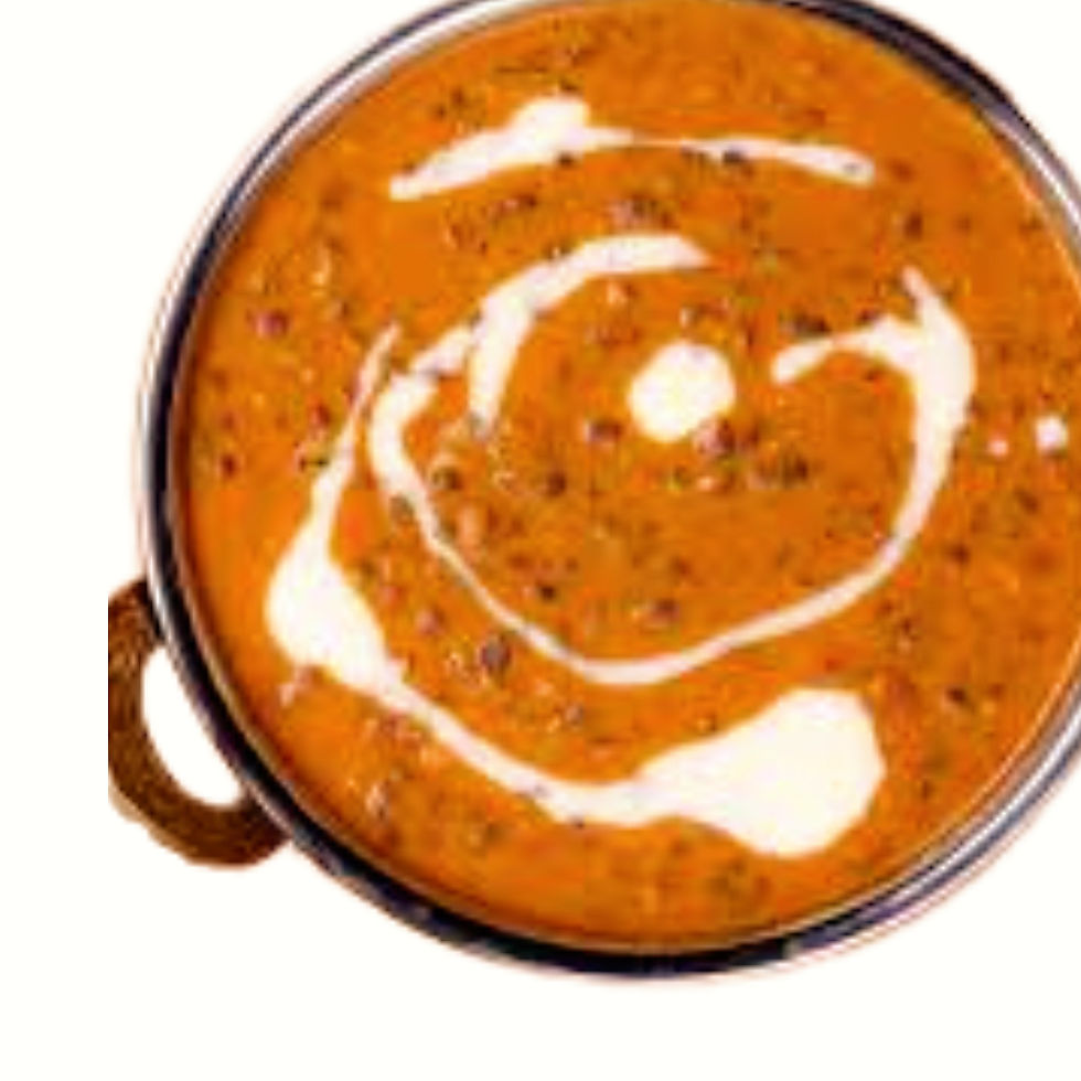 Eye-level view of a bowl of steaming Daal Makhani with a side of naan bread
