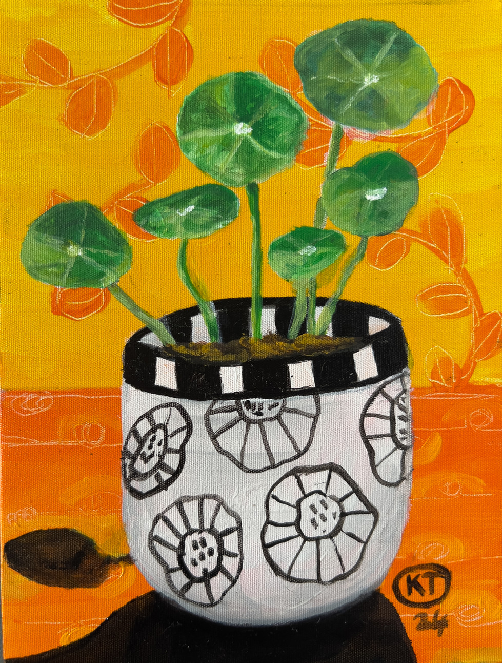 Watercress in a white pot