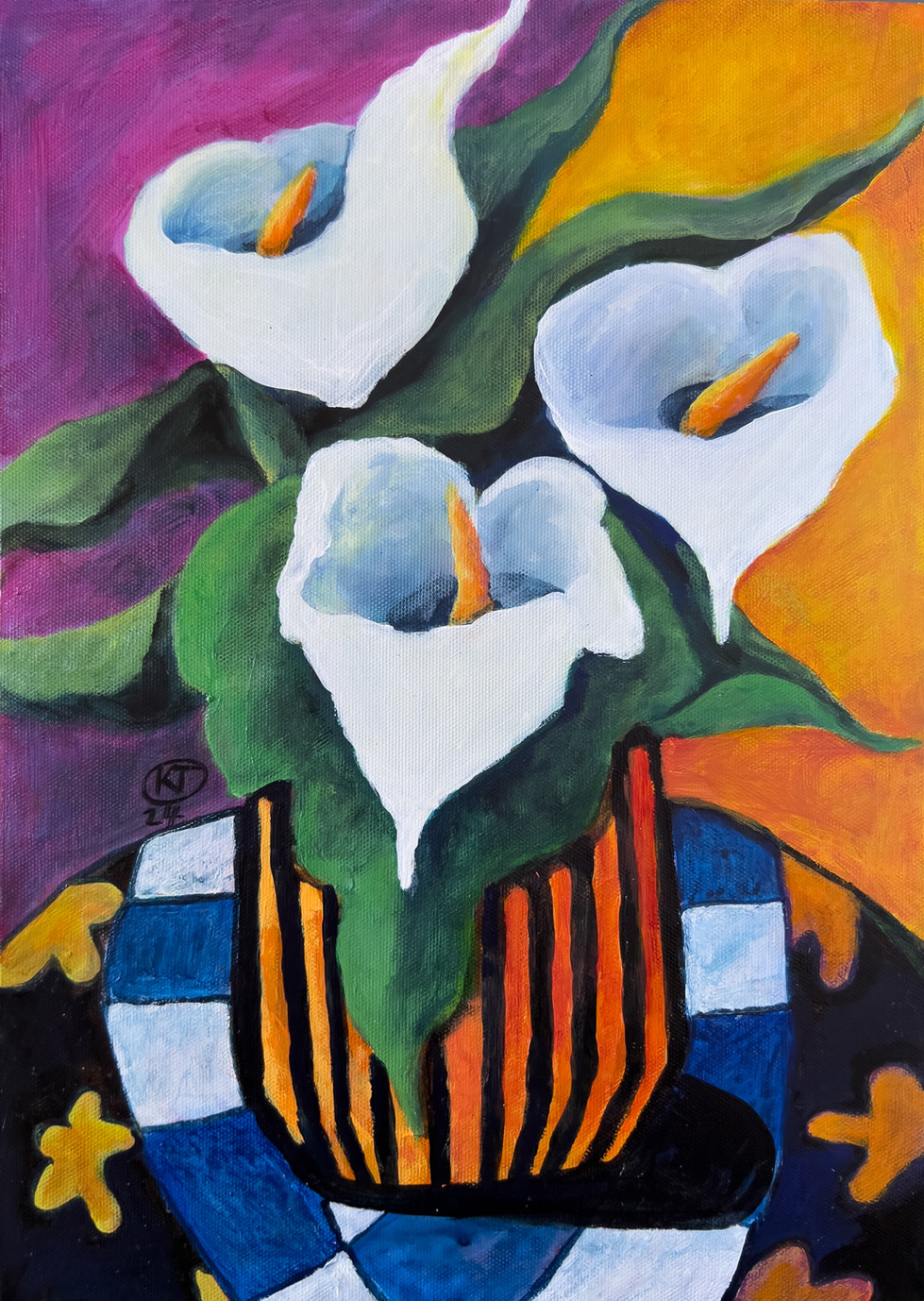 White flowers in an orange striped pot