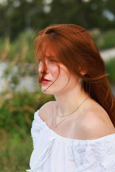 red-haired woman near the river_edited.p