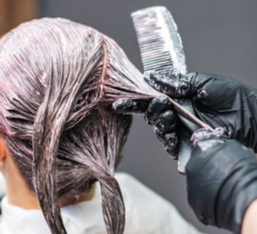 close-back-view-hairdresser-applying-260nw-1534064735.jpg