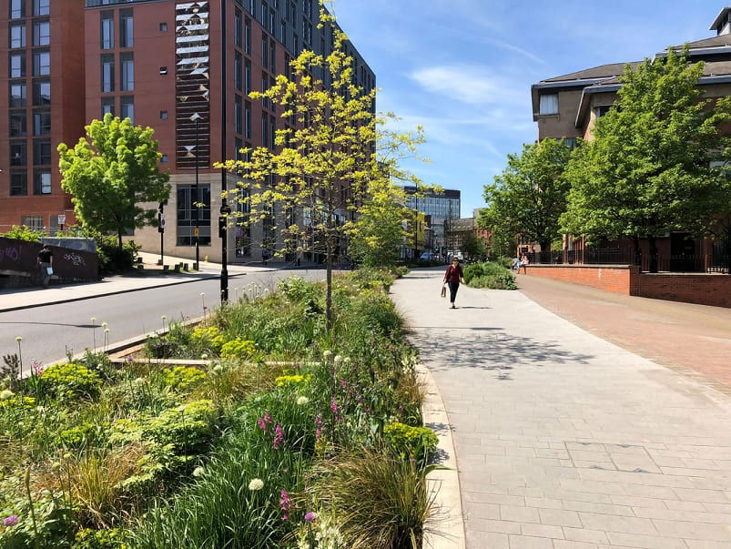 Castlegate Area of Sheffield Showing SUDS & sustainable transport woring in tandem
