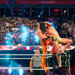 Matt Riddle and Seth Rollins wrestling at WWE Clash at the Castle, by Arthur Cauty