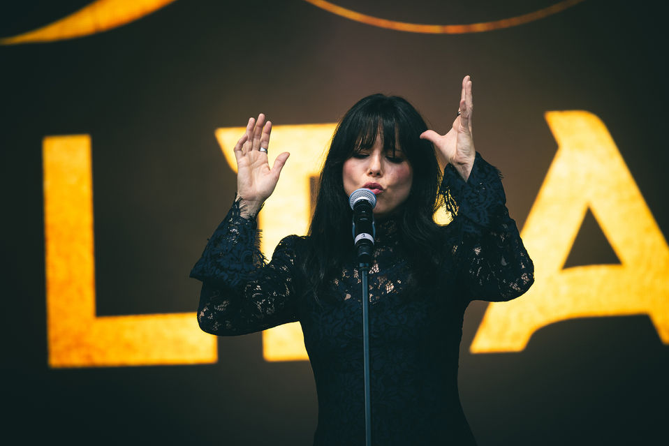 A photo of Imelda May performing at Westonbirt Arboretum, by Arthur Cauty