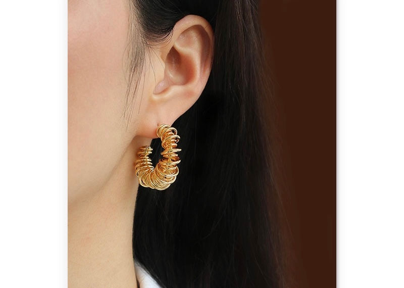 Thumbnail: Gold Plated C-Shaped Spring Twisted Earrings