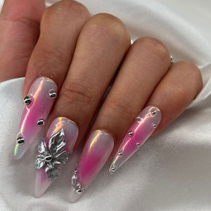 Pink ombré stiletto nails with chrome base, silver beads, and 3D orchid at Robson Nails, a nail salon near me in Vancouver