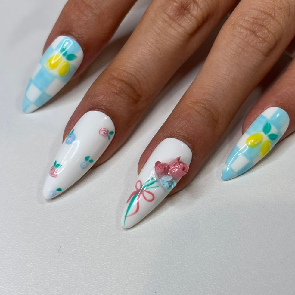 Spring floral gel nails with blue checkers, ribbon art, and yellow bows at Robson Nails & Spa, Downtown Vancouver.