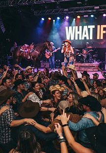 keynote concert is called _what if_. The crowd is close, people hold each others by should