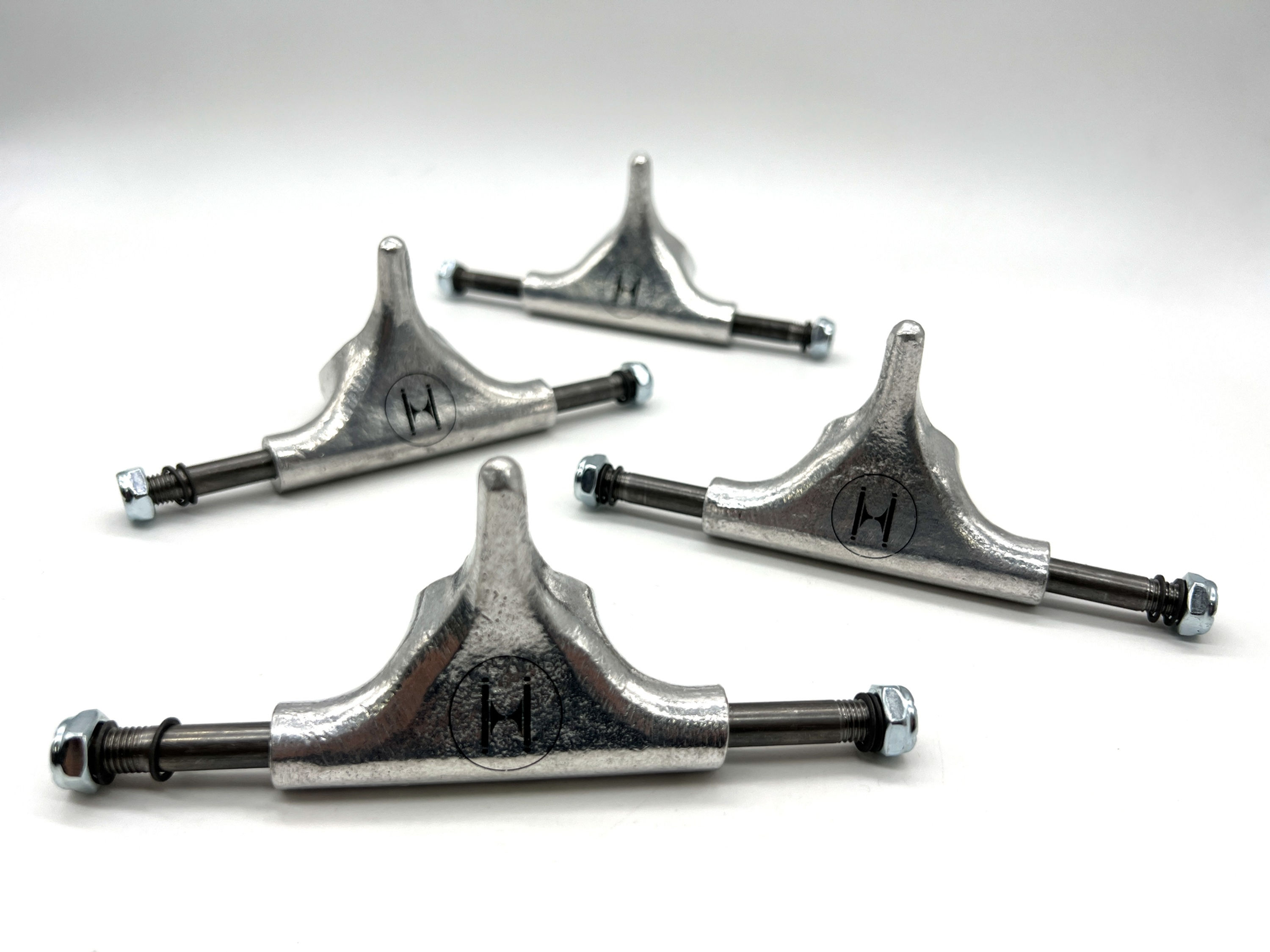 3.0" Huck trucks in silver, 4 of them