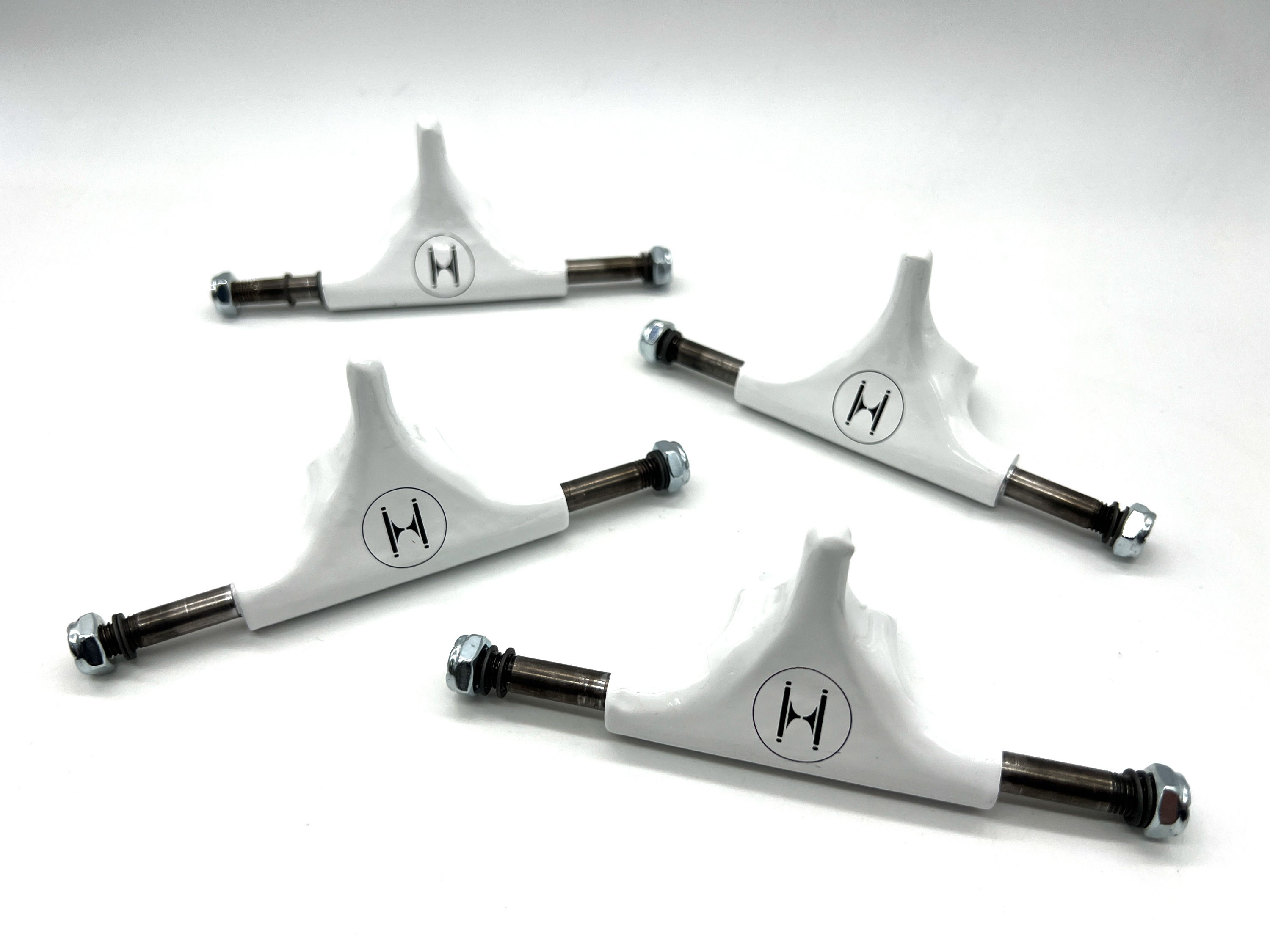 3.0" Huck trucks in white, 4 of them