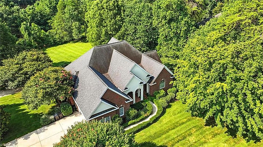Aerial view of home and lot