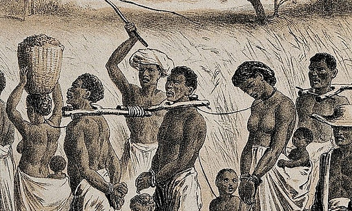 Group_of_men_and_women_being_taken_to_a_