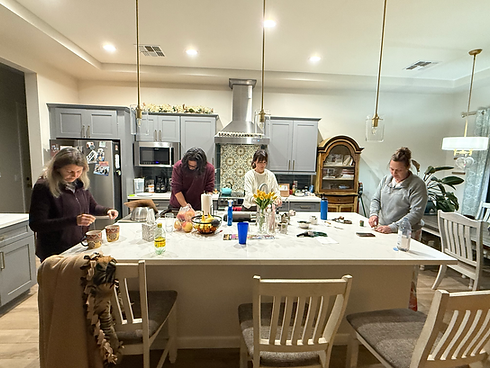 Guests gathering around kitchen